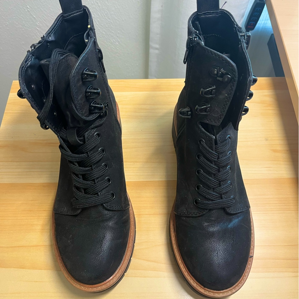 Black lace up boots! Size: Women’s 7. Color: Black. Condition: worn once!